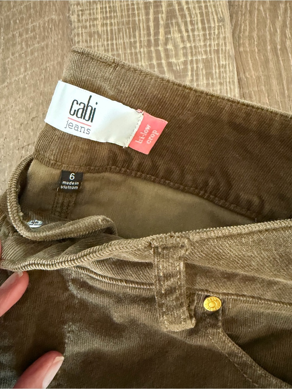 CAbi High-Low Crop Flare Jeans in Olive Green - Picture 3 of 4